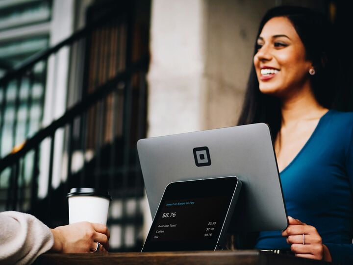 Professional speaking with a customer about payment options