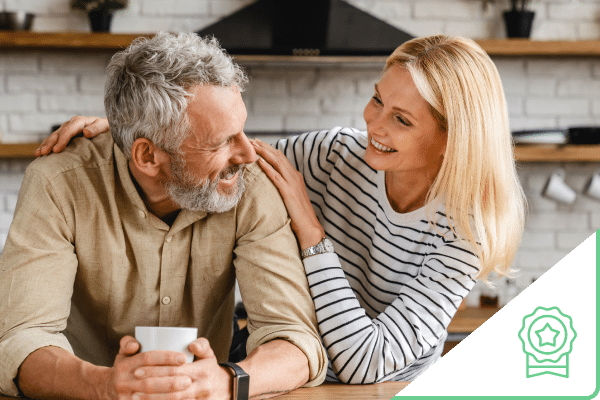 Older couple smiling at each other